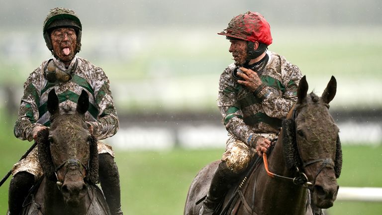 Davy Russell (left) on Grand Roi after running in a wet and wild Coral Cup at the Cheltenham Festival