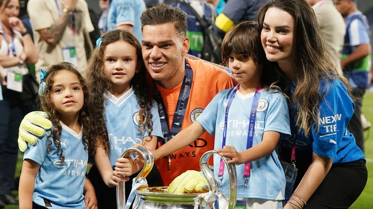 Ederson celebrates the Champions League win with his wife and three children