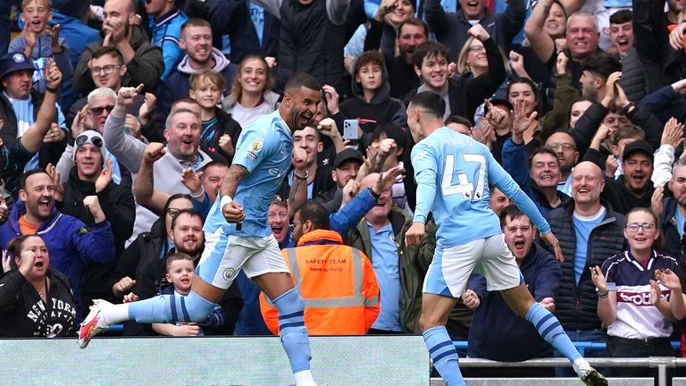 Manchester City&#39;s Phil Foden (right) celebrates scoring their side&#39;s first goal of the game with team-mate Kyle Walker during the Premier League match at the Etihad Stadium, Manchester. Picture date: Saturday September 23, 2023.

