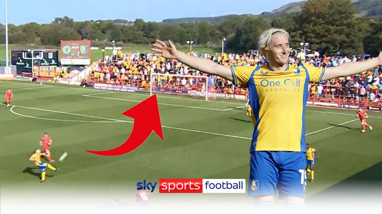 Mansfield's Aaron Lewis volleys the Accrington goalkeeper's clearance, first-time, to score what is surely one of the goals of the season..