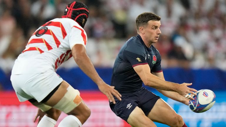 England's George Ford passes the ball under pressure from Japan's Michael Leitch during the Rugby World Cup Pool D match between England and Japan in the Stade de Nice, in Nice, France Sunday, Sept. 17, 2023. (AP Photo/Pavel Golovkin)