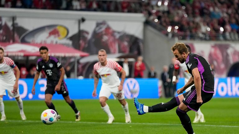 Bayern&#39;s Harry Kane scores his side&#39;s opening goal from the penalty spot during the German Bundesliga soccer match between Leipzig and Bayern Munich