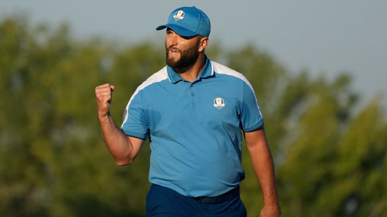 Europe&#39;s Jon Rahm celebrates after his putt on the 3rd green during his morning Foursome match at the Ryder Cup golf tournament at the Marco Simone Golf Club in Guidonia Montecelio, Italy, Friday, Sept. 29, 2023. (AP Photo/Alessandra Tarantino)