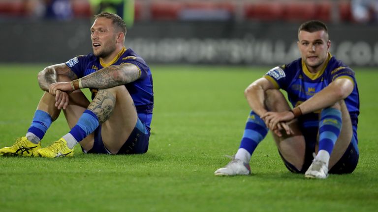 Wakefield Trinity's Josh Griffin (left) and Wakefield Trinity's Max Jowitt look dejected as their relegation is confirmed