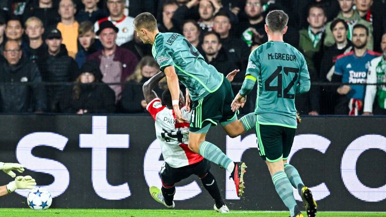 ROTTERDAM, NETHERLANDS - SEPTEMBER 19: Celtic's Gustaf Lagerbielke fouls Feyenoord's Igor Paixao which results in red card and a penalty during a UEFA Champions League Group E Match between Feyenoord and Celtic at Stadion Feijenoord De Kuip, on September 19, 2023, in Rotterdam, Netherlands. (Photo by Paul Devlin / SNS Group)