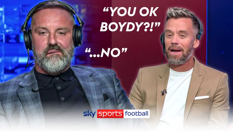 Lee Hendrie and Kris Boyd react to England&#39;s second goal against Scotland