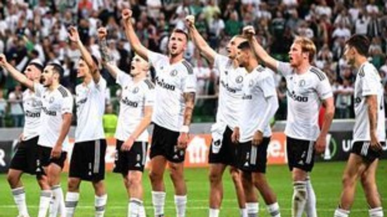 Legia Warsaw celebrate their victory over Aston Villa in the Europa Conference League at full-time