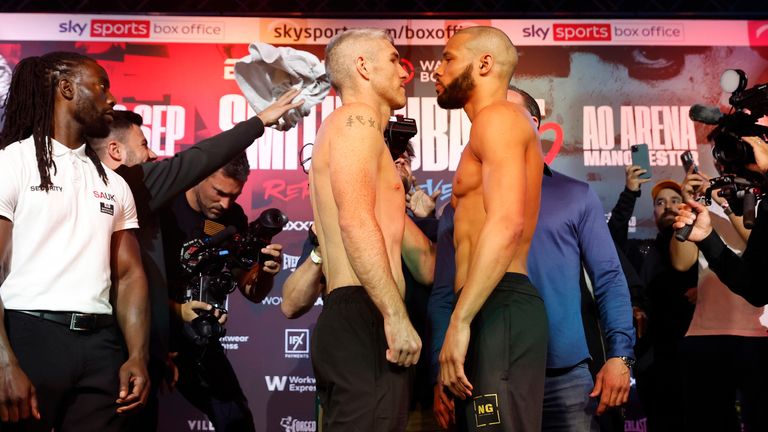 Neither Liam Smith nor Chris Eubank Jr break concentration as towels fly around them