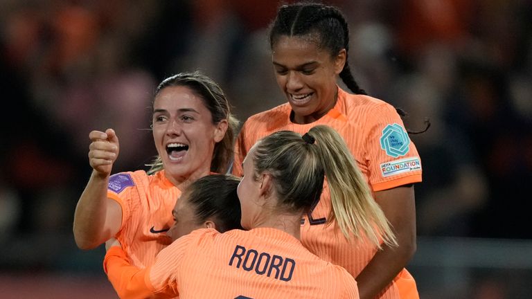 Netherlands' Lieke Martens, second from left, celebrates with her team-mates after scoring vs England