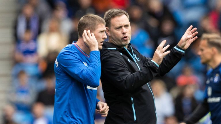 GLASGOW, SCOTLAND - JULY 22: Rangers Manager Michael Beale speaks to John Lundstram during a pre-season friendly match between Rangers and Hamburg at Ibrox Stadium, on July 22, 2023, in Glasgow, Scotland.  (Photo by Alan Harvey / SNS Group)