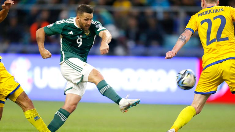 Northern Ireland's Conor Washington in action