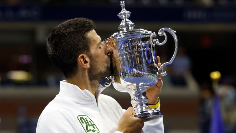 Serbia&#39;s Novak Djokovic kisses the trophy after defeating Russia&#39;s Daniil Medvedev during the US Open tennis tournament men&#39;s singles final match at the USTA Billie Jean King National Tennis Center in New York City, on September 10, 2023. (Photo by kena betancur / AFP) (Photo by KENA BETANCUR/AFP via Getty Images)