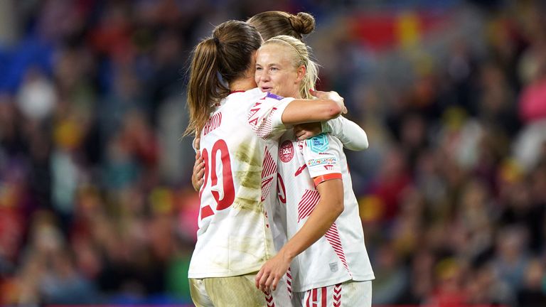 Former Chelsea forward Pernille Harder (right) scored a hat-trick for the Danes