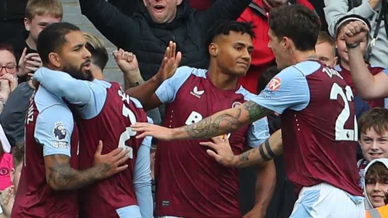 Aston Villa players celebrates after Ollie Watkins scores against Brighton