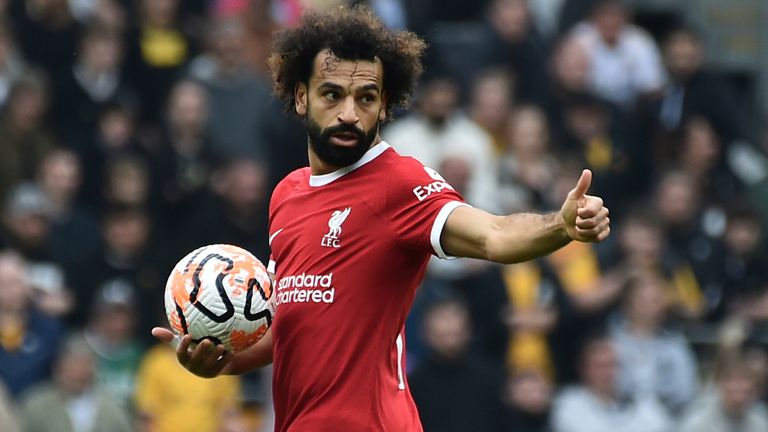 Mo Salah celebrates after setting up Cody Gakpo's equaliser against Wolves