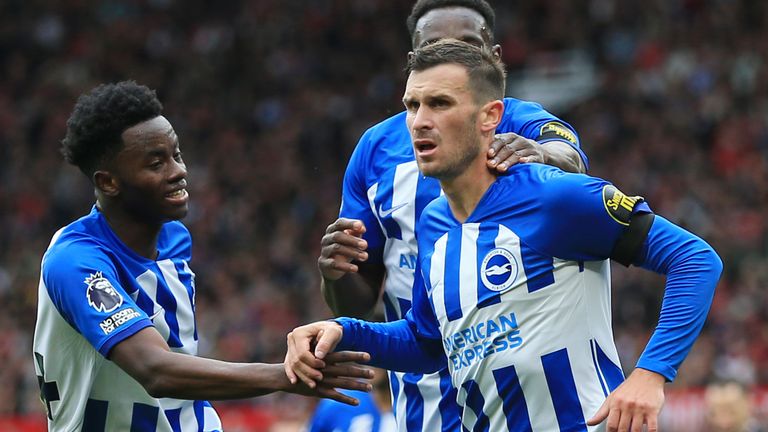 Pascal Gross celebrates after doubling Brighton's lead against Manchester United