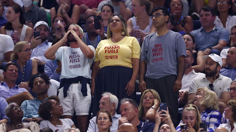 Protesters disrupt the Women's Singles Semifinal match between Coco Gauff of the United States and Karolina Muchova of the Czech Republic on Day Eleven of the 2023 US Open at the USTA Billie Jean King National Tennis Center on September 07, 2023 in the Flushing neighborhood of the Queens borough of New York City. (Photo by Elsa/Getty Images)