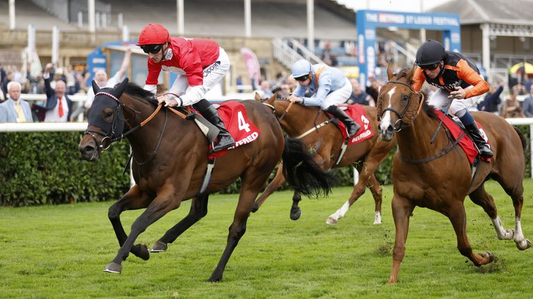Rogue Lightning gets the better of Raasel to win the Scarbrough Stakes at Doncaster