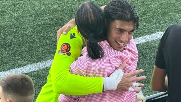 6ft 5in Punjabi shot-stopper Rohan Luthra embraces Sky Sports News' Dev Trehan after his first clean sheet for Slough Town