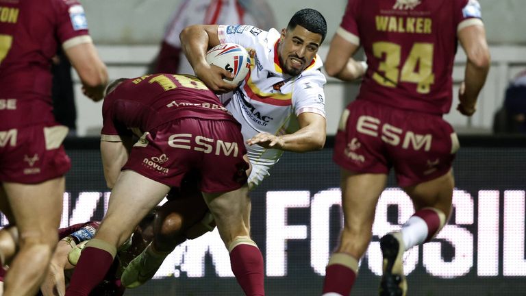 Catalans Dragons' Fouad Yaha scores his side's third try of the game