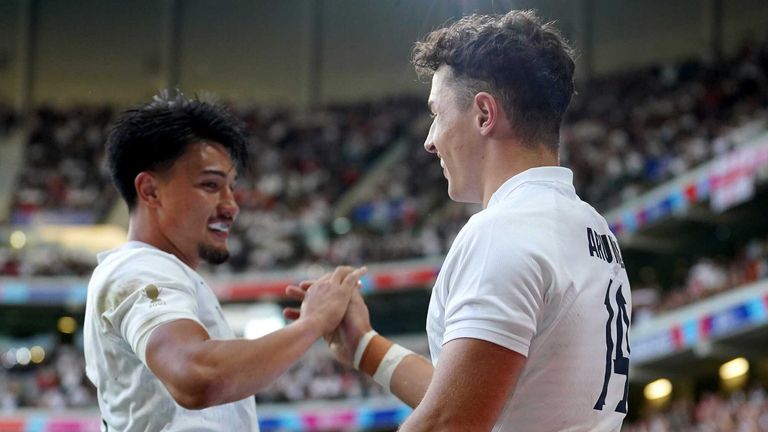 England's Marcus Smith (L) and team-mate Henry Arundell celebrate a try against Chile at the 2023 World Cup (PA Images)