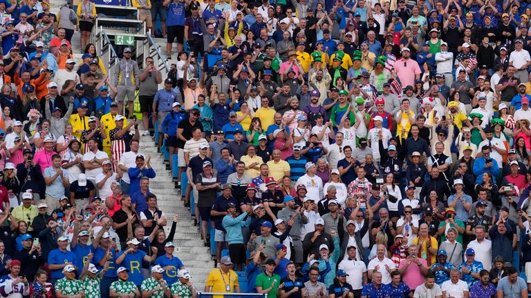 Fans wait in the stands for the start of the first morning Foursome match on the 1st tee at the Ryder Cup golf tournament at the Marco Simone Golf Club in Guidonia Montecelio, Italy, Friday, Sept. 29, 2023. (AP Photo/Andrew Medichini)