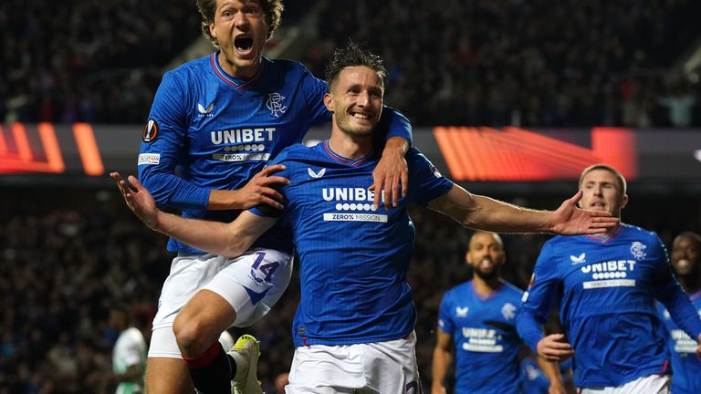 Rangers' Sam Lammers (left) and Ben Davies celebrate Abdallah Sima's goal