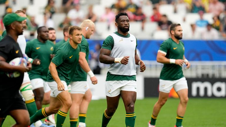 South Africa's Siya Kolisi warms up 