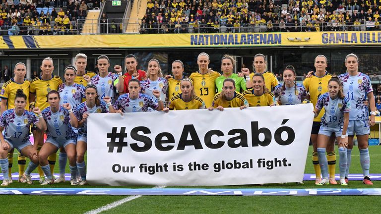The Spanish and the Swedish team pose with a banner reading "#it's over, our fight is the global fight" ahead the UEFA women's Nation League football match Sweden vs Spain in Gothenburg, on September 22, 2023. (Photo by Jonathan NACKSTRAND / AFP) (Photo by JONATHAN NACKSTRAND/AFP via Getty Images)