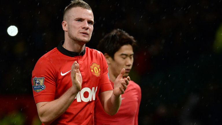 Manchester United's Tom Cleverley and Shinji Kagawa leave the pitch after their teams 2-1 defeat against Swansea City
