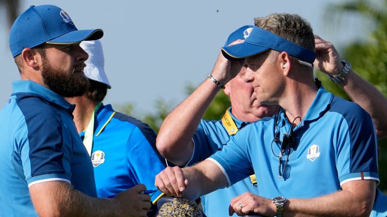 Europe's Tyrrell Hatton, left speaks to Europe's Team Captain Luke Donald on the 10th tee during a practice round ahead of the Ryder Cup at the Marco Simone Golf Club in Guidonia Montecelio, Italy, Wednesday, Sept. 27, 2023. The Ryder Cup starts Sept. 29, at the Marco Simone Golf Club. (AP Photo/Alessandra Tarantino)