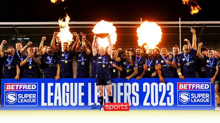 Wigan Warriors lift the League Leaders' Shield after beating Leigh in their final game of the Super League regular season
