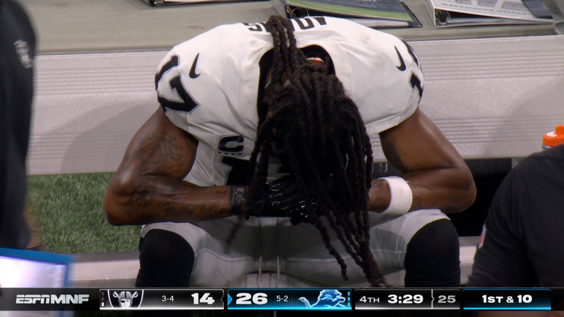 Frustrated Adams slams helmet during Raiders defeat