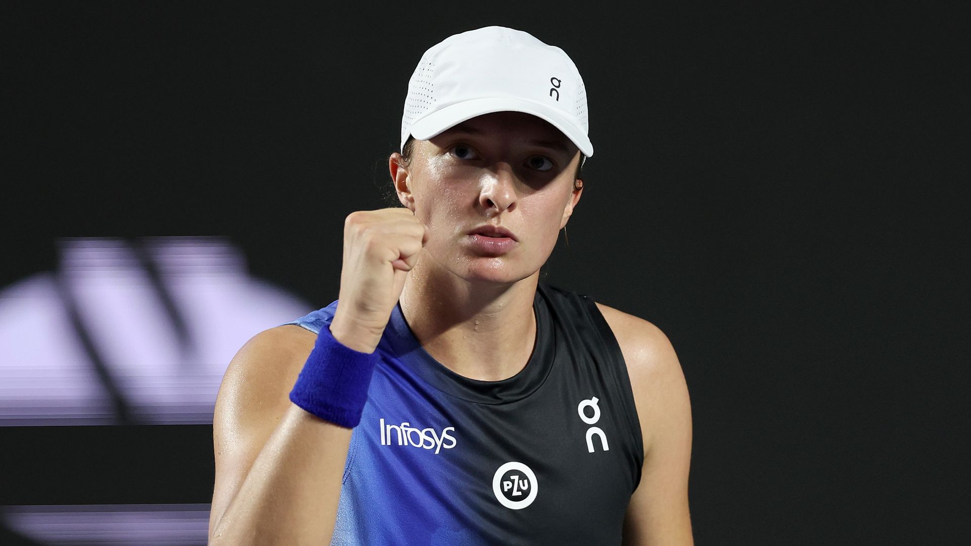 Swiatek overcomes slow start to beat Vondrousova at WTA Finals