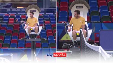 Andy Murray enjoys ride in umpire's chair!