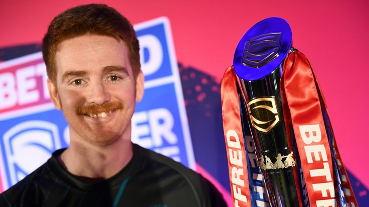 Picture by Simon Wilkinson/SWpix.com - 09/02/2023 - Rugby League - Betfred Super League - Betfred Super League Launch 2023 - Manchester Science & Industry Museum - Manchester, England - James SImpson with the Betfred Superleague Wheelchair trophy.