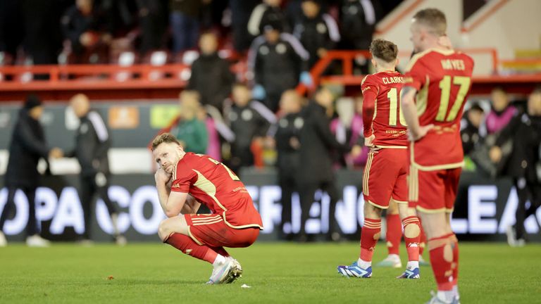 Aberdeen's Nicky Devlin (left) reacts following defeat during the UEFA Europa Conference League Group G match at Pittodrie Stadium, Aberdeen. Picture date: Thursday October 26, 2023.