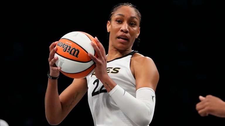 Las Vegas Aces&#39; A&#39;ja Wilson (22) looks to pass during the second half in Game 4 of a WNBA basketball final playoff series against the New York Liberty, Wednesday, Oct. 18, 2023, in New York. The Aces won 70-69. (AP Photo/Frank Franklin II)