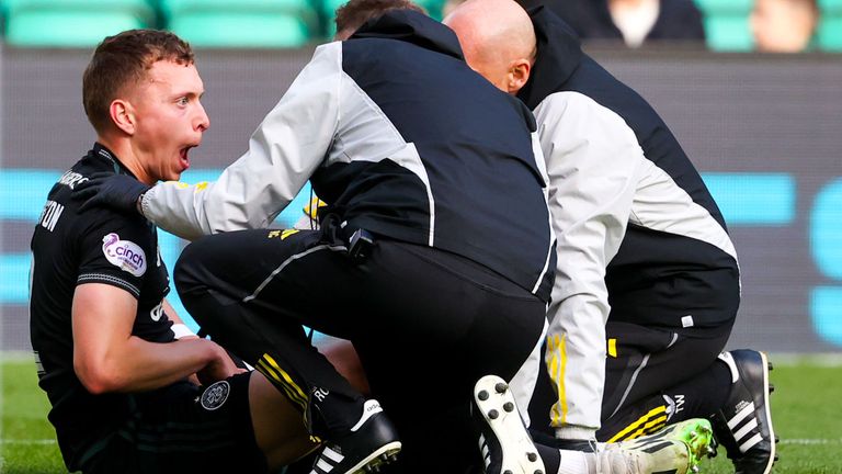 Celtic's Alistair Johnston was forced off with a head injury