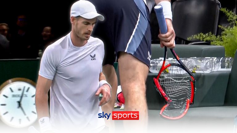 Andy Murray smashes his racket after losing in the Paris Masters