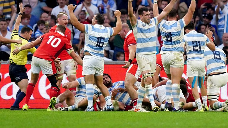 Argentina's players celebrate after Joel Sclavi scored their first try