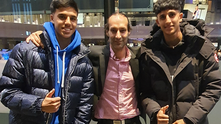 Brandon Khela (left) and his younger brother Reiss Khela with Sky Sports News&#39; Dev Trehan at an event to celebrate Vaisakhi at Wembley Stadium earlier this year