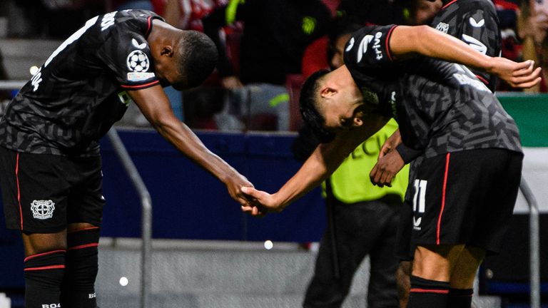 Callum Hudson Odoi (left) celebrates scoring for Bayer Leverkusen in the Champions League