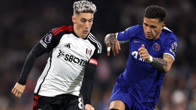 Harry Wilson of Fulham is challenged by Enzo Fernandez of Chelsea 
