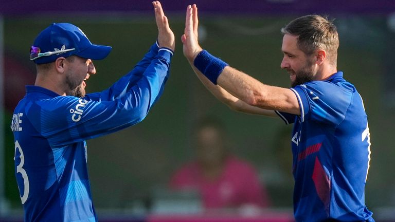 England&#39;s Chris Woakes celebrates the wicket of Bangladesh&#39;s Litton Das during the ICC Men&#39;s Cricket World Cup match between England and Bangladesh in Dharamshala, India, Tuesday, Oct. 10, 2023. (AP Photo/Ashwini Bhatia)