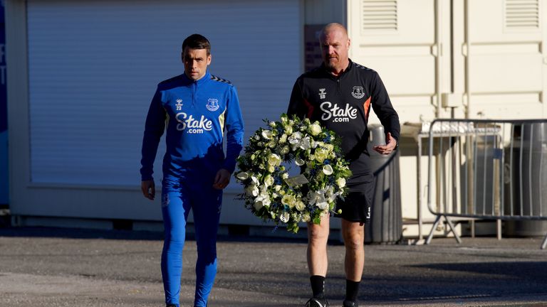 Everton captain Seamus Coleman and manager Sean Dyche going to lay flowers outside Goodison Park in Liverpool in tribute to Everton chairman Bill Kenwright who died on Monday at the age of 78. Picture date: Wednesday October 25, 2023.