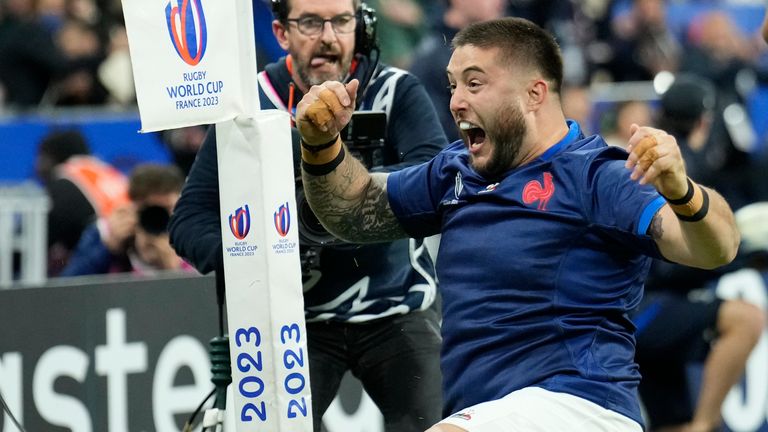 France's Cyril Baille celebrates after scoring a try during the Rugby World Cup quarterfinal match between France and South Africa at the Stade de France in Saint-Denis, near Paris Sunday, Oct. 15, 2023. (AP Photo/Christophe Ena)