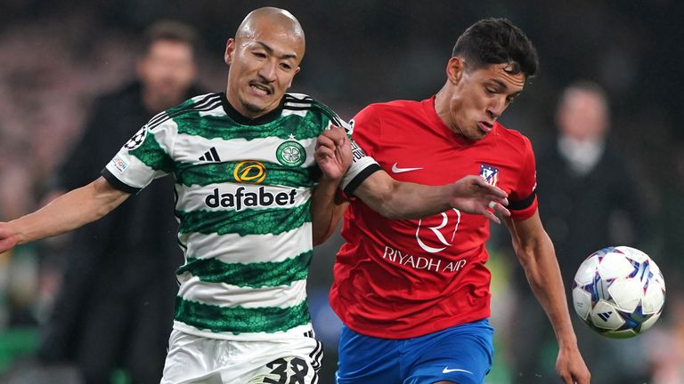 Celtic's Daizen Maeda (left) and Atletico Madrid's Nahuek Molina battle for the ball