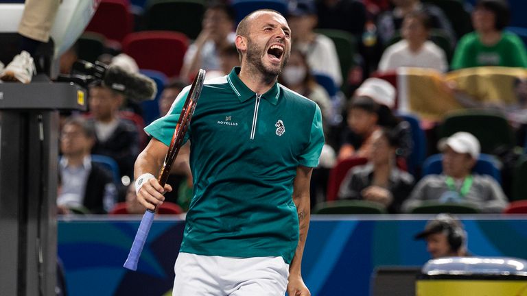 Dan Evans of Great Britain reacts during his match against Carlos Alcaraz of Spain in their men&#39;s singles round of 32 match on Day 8 of the 2023 Shanghai Rolex Masters at Qi Zhong Tennis Centre on October 09, 2023 in Shanghai, China. (Photo by Hugo Hu/Getty Images)