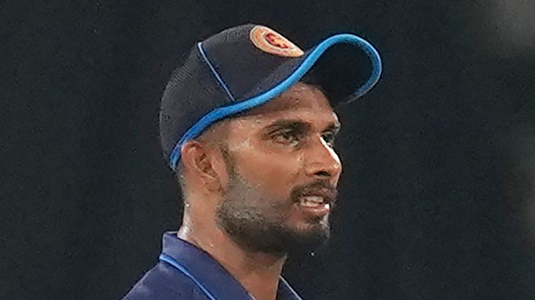 Sri Lanka's captain Dasun Shanaka, left, speaks to Matheesha Pathirana during the ICC Cricket World Cup match between Pakistan and Sri Lanka in Hyderabad, India, Tuesday, Oct. 10, 2023. (AP Photo/Rafiq Maqbool)